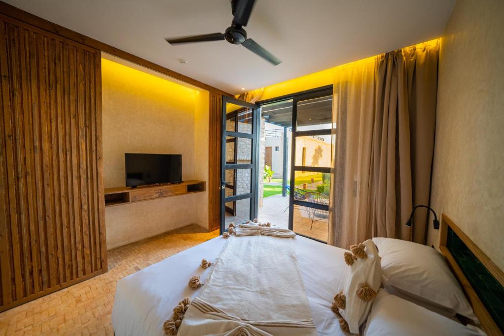 Postel nebo postele na pokoji v ubytování BABERRIH Hôtel Hospitality Palaces & Resorts