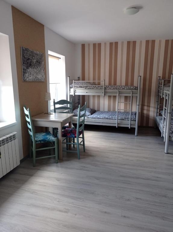 Postel nebo postele na pokoji v ubytování Dom Mili