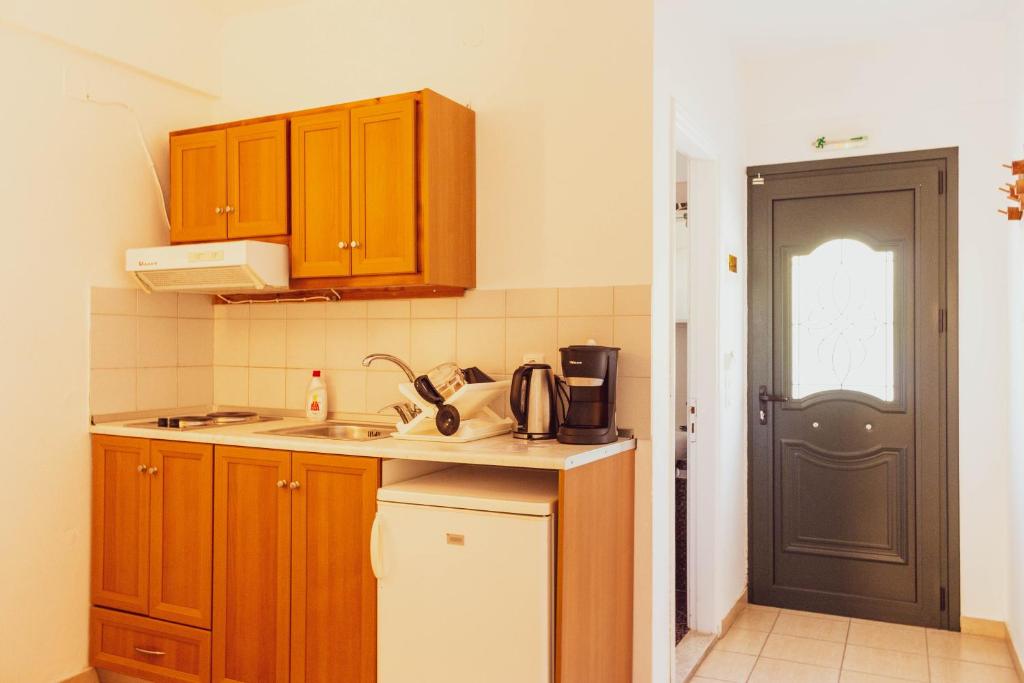 A kitchen or kitchenette at Apagio Apartments