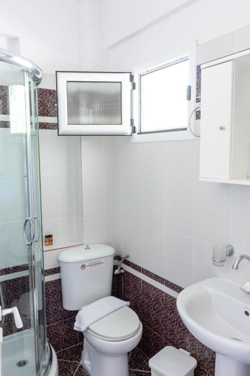 A bathroom at Apagio Apartments