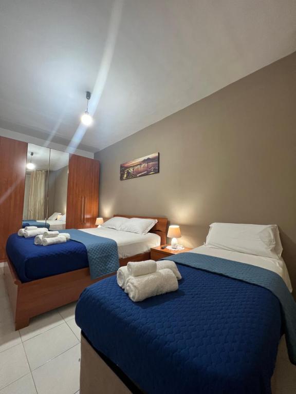 Postel nebo postele na pokoji v ubytování La Nova apartment