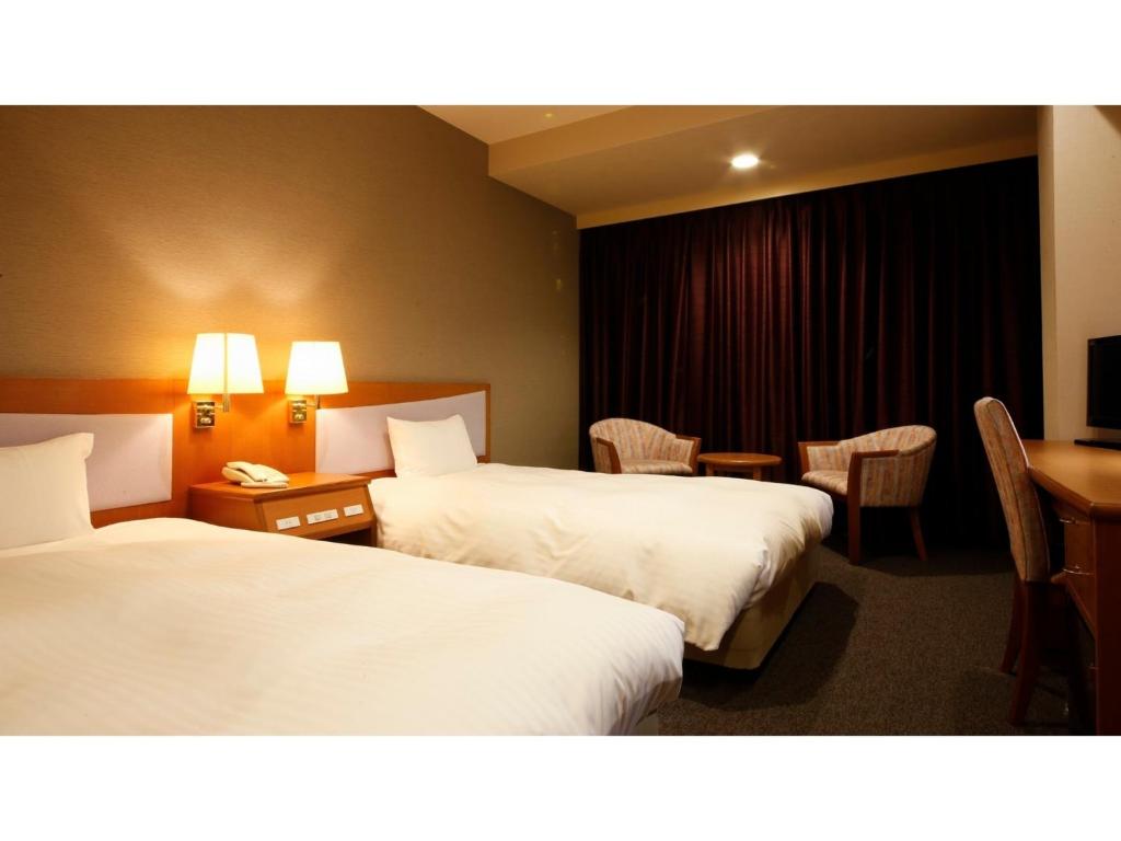 เตียงในห้องที่ Ako onsen AKO PARK HOTEL - Vacation STAY 21635v