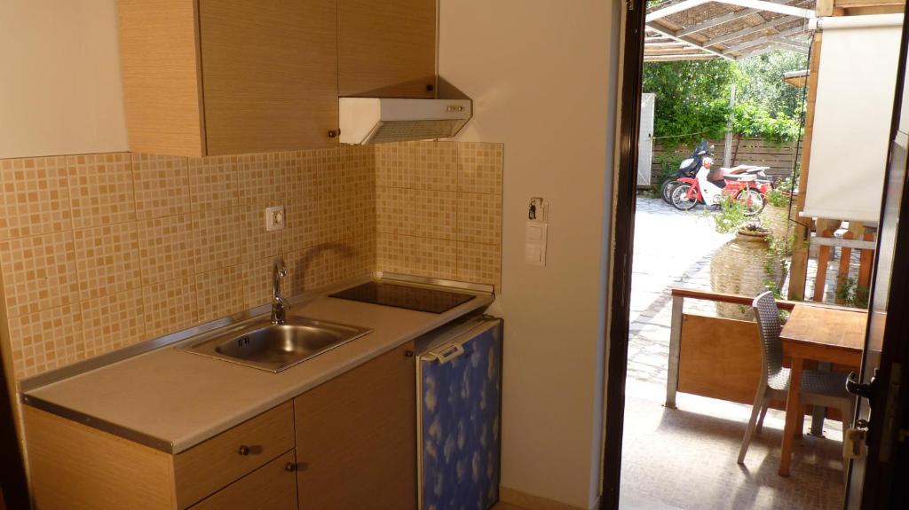 A kitchen or kitchenette at Apagio Apartments