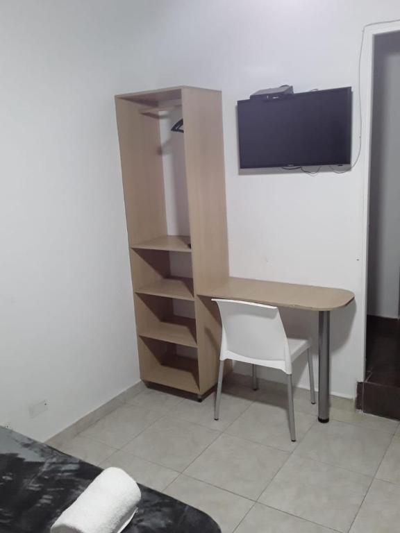 TV a/nebo společenská místnost v ubytování Primavera Hotel