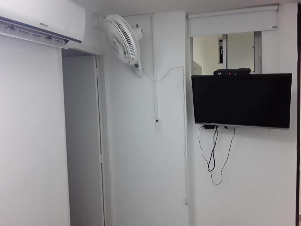TV a/nebo společenská místnost v ubytování Primavera Hotel