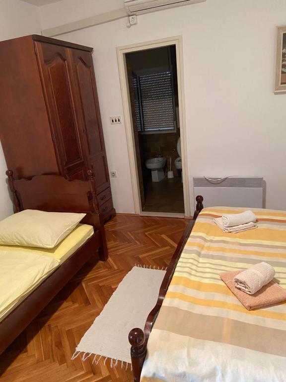 Posteľ alebo postele v izbe v ubytovaní Rooms Juran