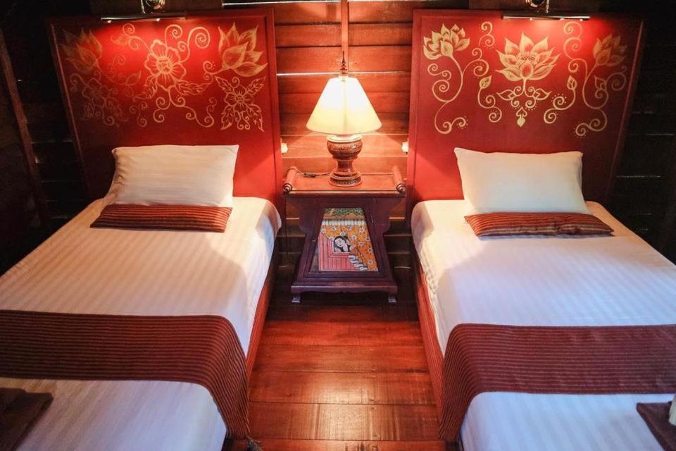 Ein Bett oder Betten in einem Zimmer der Unterkunft Leeloo Paradise