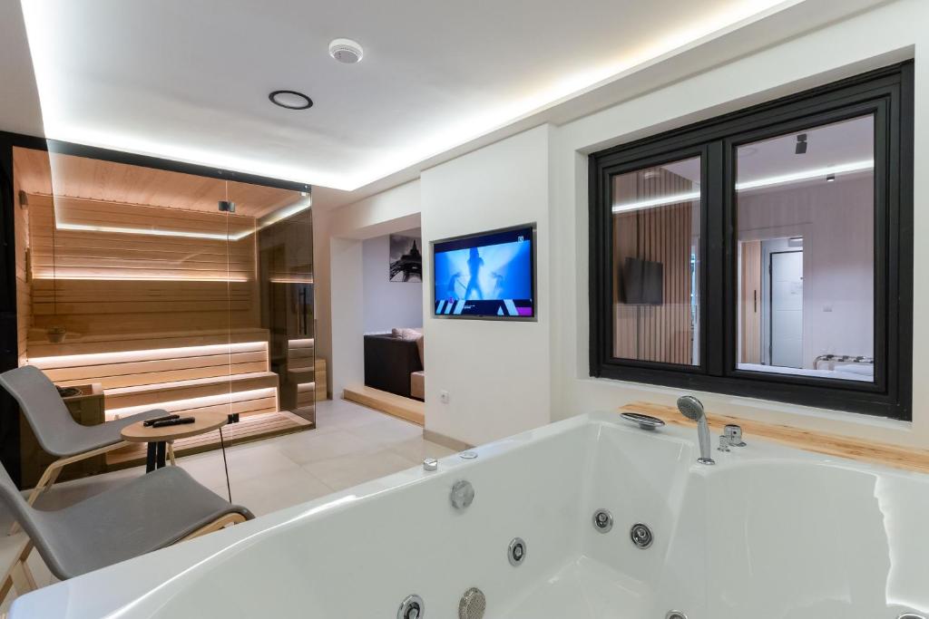 Et badeværelse på President Apartman Spa