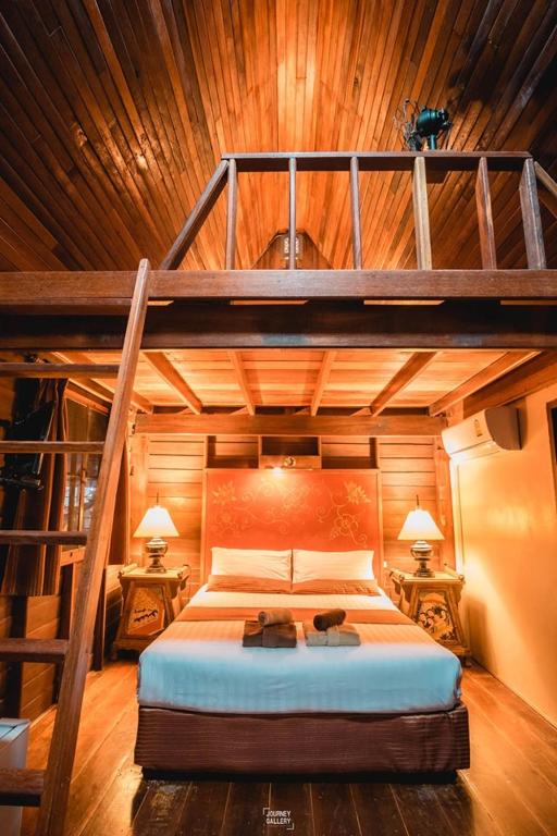 Ein Bett oder Betten in einem Zimmer der Unterkunft Leeloo Paradise