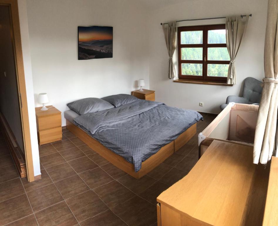 Postel nebo postele na pokoji v ubytování Cihlarka 301