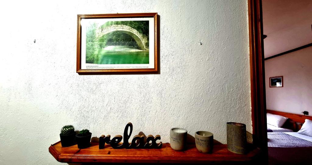 Postel nebo postele na pokoji v ubytování Vikos View
