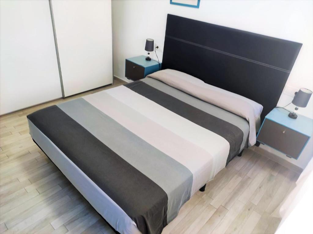 Postel nebo postele na pokoji v ubytování Cris Sol Apartments