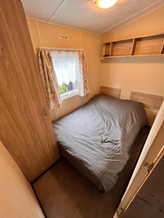 Postel nebo postele na pokoji v ubytování Le Père André Hotton