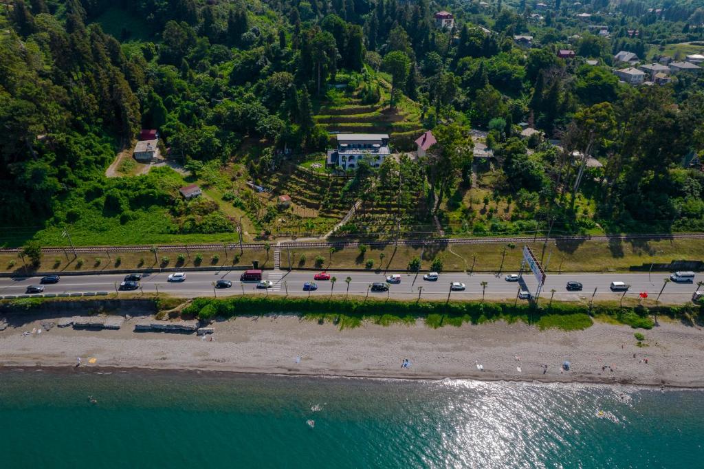 an aerial view of a road next to the water at House at the Sea in Batumi