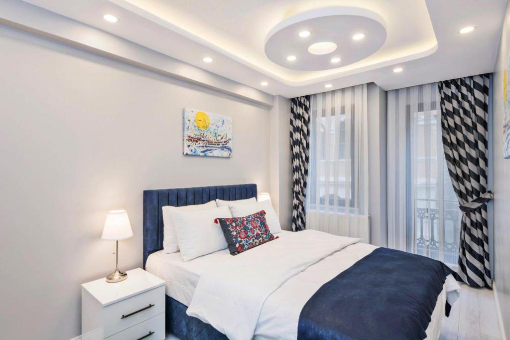 Postel nebo postele na pokoji v ubytování Taksim Devrim House