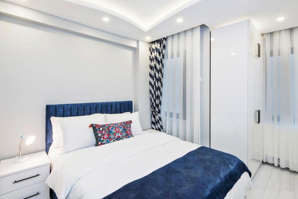 Postel nebo postele na pokoji v ubytování Taksim Devrim House