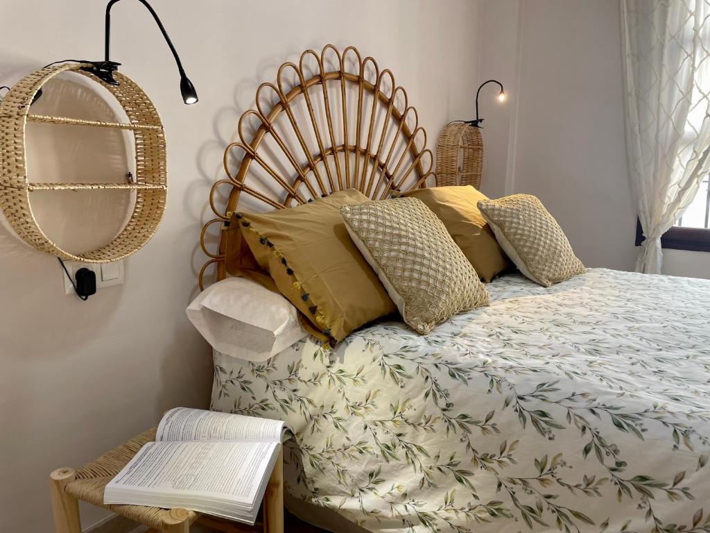 A bed or beds in a room at El descanso del almorávide