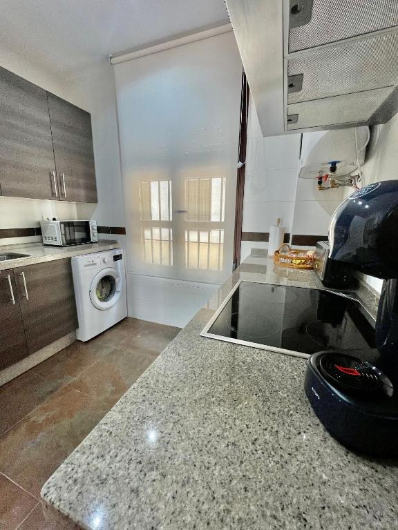 A kitchen or kitchenette at El descanso del almorávide