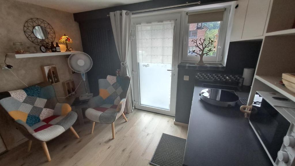Kuchyň nebo kuchyňský kout v ubytování "En Aqualye" chambre privative chez l'habitant