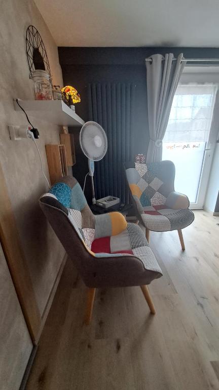 Posezení v ubytování "En Aqualye" chambre privative chez l'habitant