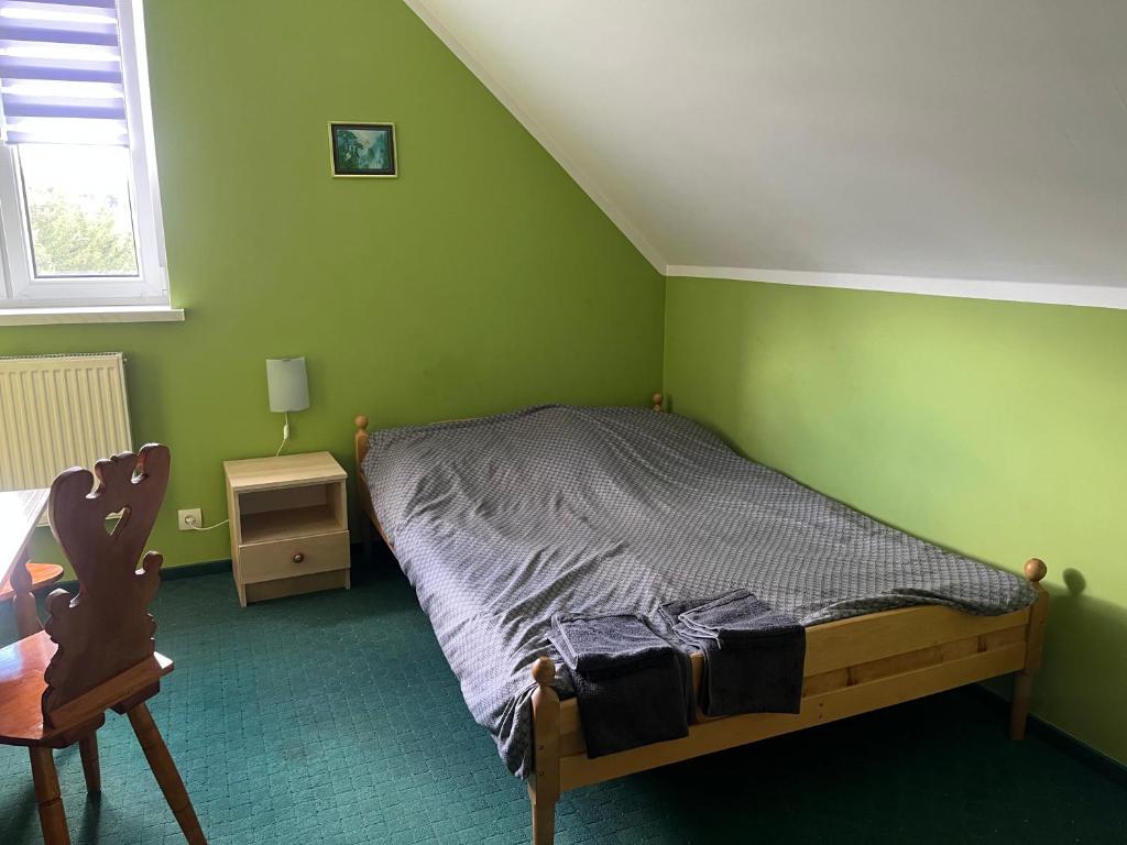 Postel nebo postele na pokoji v ubytování Agroturystyka Radzewicz