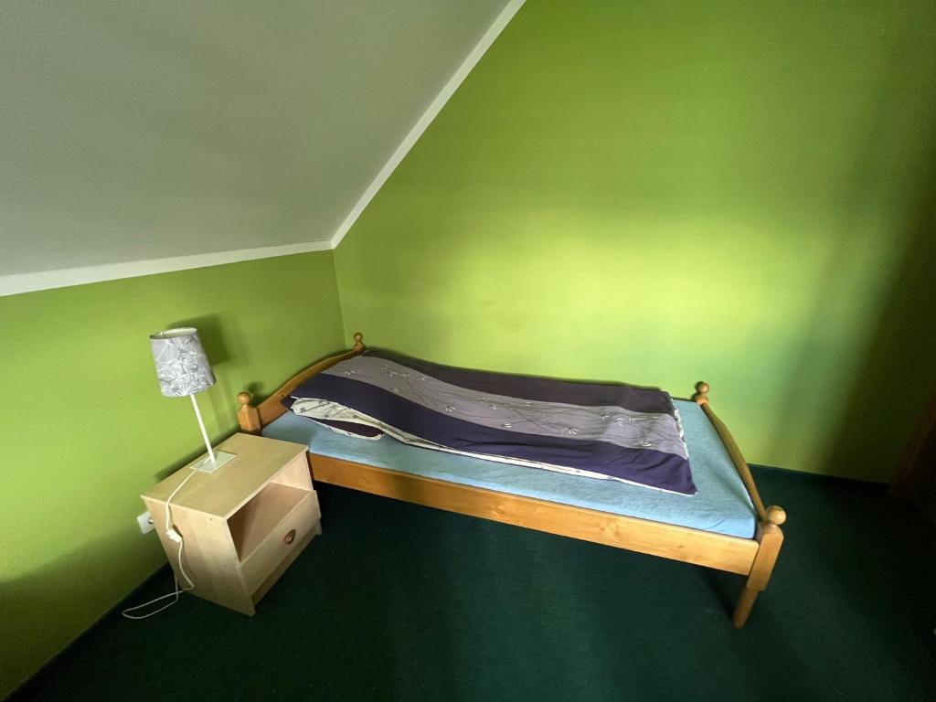 Postel nebo postele na pokoji v ubytování Agroturystyka Radzewicz
