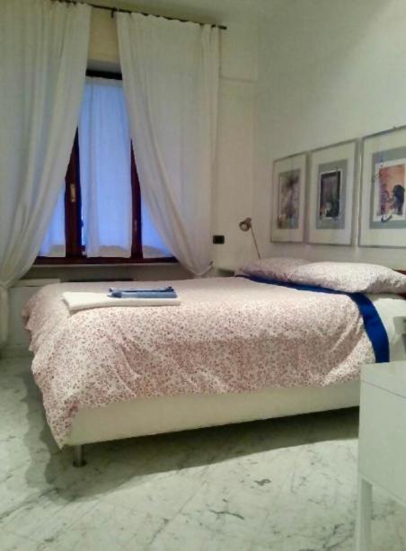 Postel nebo postele na pokoji v ubytování B&B Al Molo