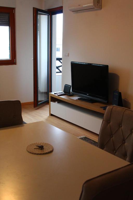 TV a/nebo společenská místnost v ubytování Exceptional Suite