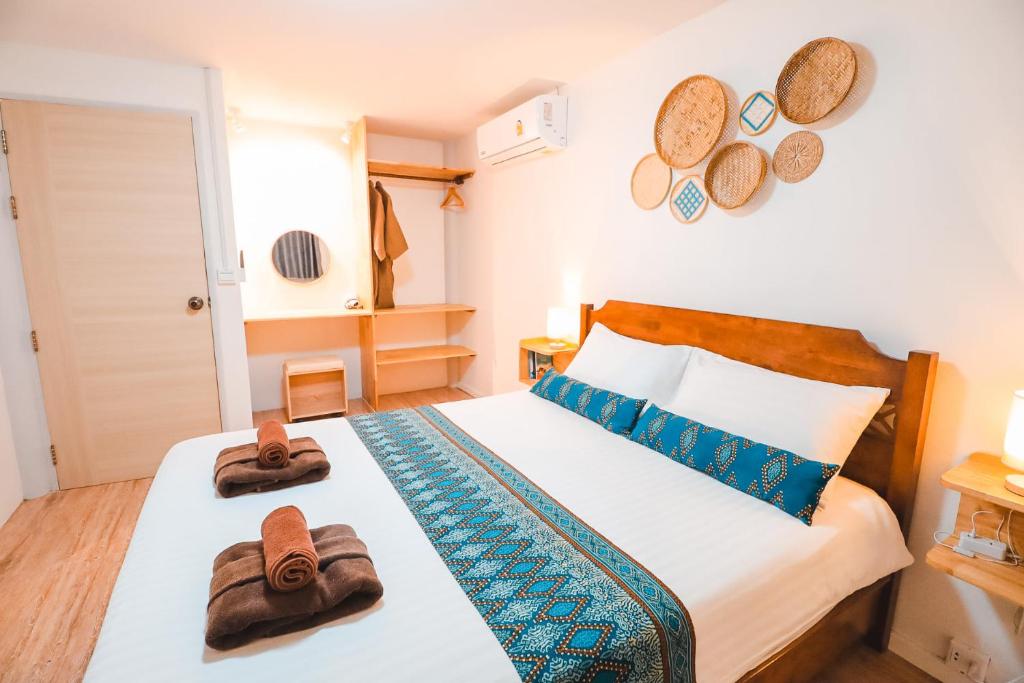 Ein Bett oder Betten in einem Zimmer der Unterkunft Leeloo Paradise
