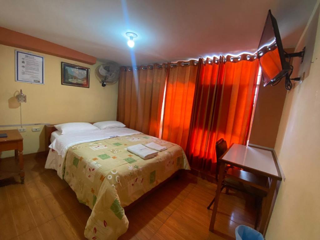 Postel nebo postele na pokoji v ubytování HOSTAL HOGAR 3 Estrellas - CHEPÉN