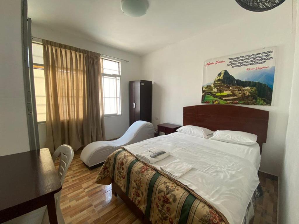 Postel nebo postele na pokoji v ubytování HOSTAL HOGAR 3 Estrellas - CHEPÉN