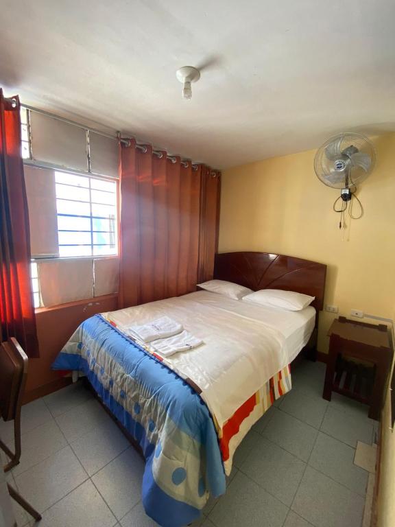 Postel nebo postele na pokoji v ubytování HOSTAL HOGAR 3 Estrellas - CHEPÉN