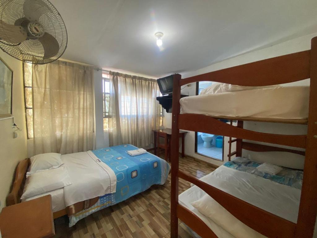 Postel nebo postele na pokoji v ubytování HOSTAL HOGAR 3 Estrellas - CHEPÉN