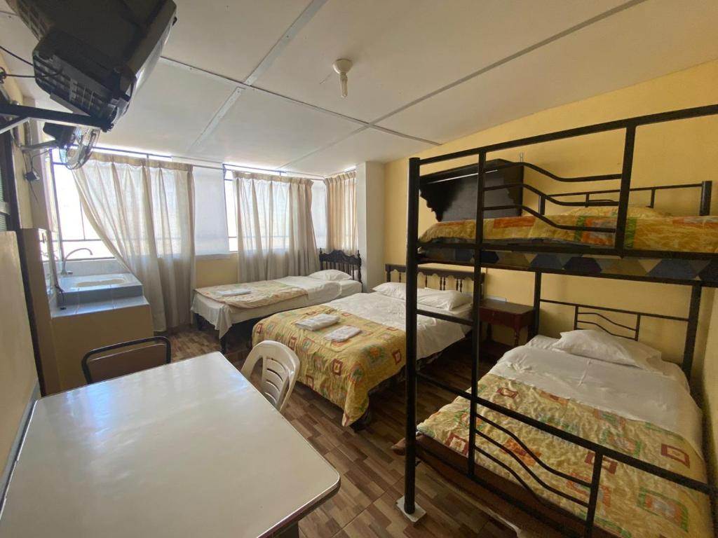 Postel nebo postele na pokoji v ubytování HOSTAL HOGAR 3 Estrellas - CHEPÉN
