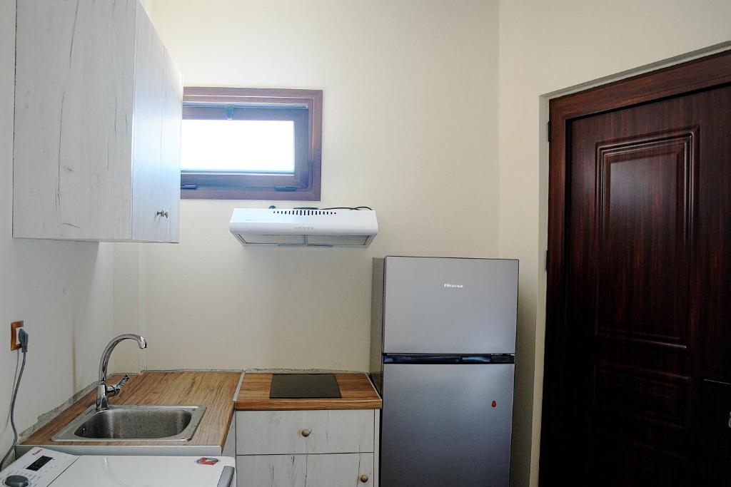 Kuchyň nebo kuchyňský kout v ubytování Giota's Gasthaus