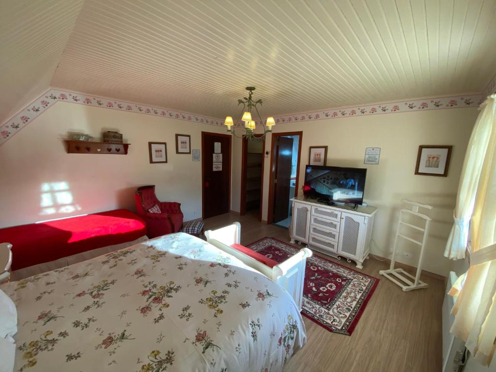 Postel nebo postele na pokoji v ubytování Pousada Chateau Colinas