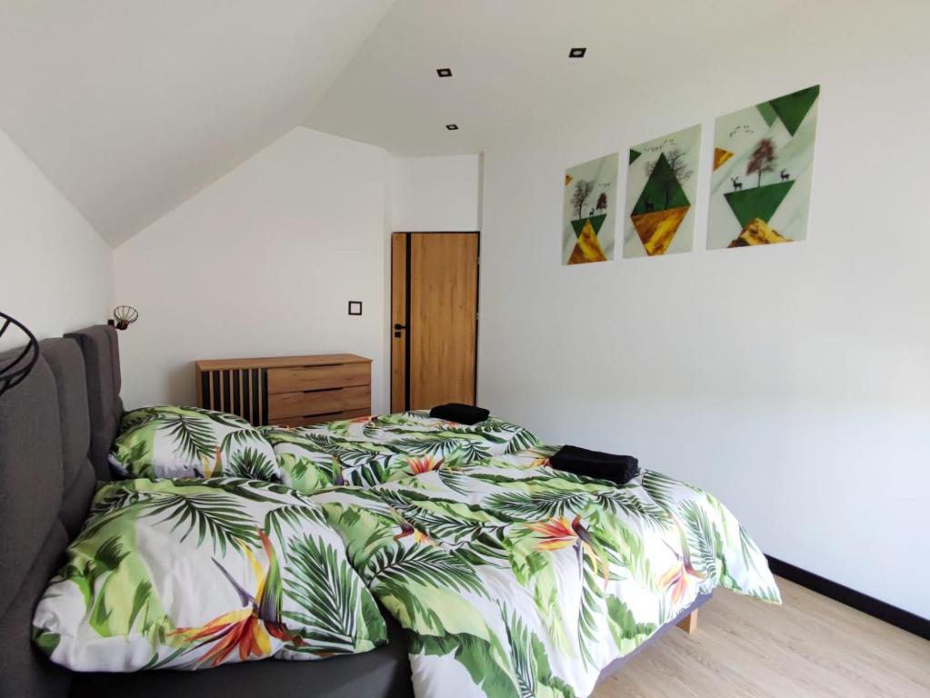 Ένα ή περισσότερα κρεβάτια σε δωμάτιο στο Jelonkowo