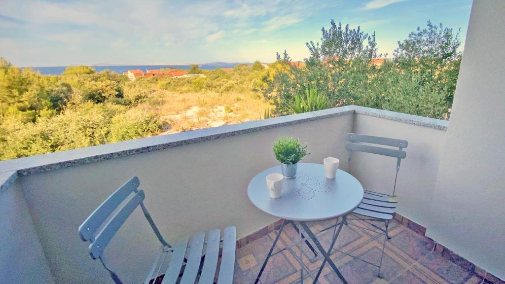 Fotografia z galérie ubytovania Pakostane - VRGADA -appartement 50 m2 avec piscine v Pakoštane