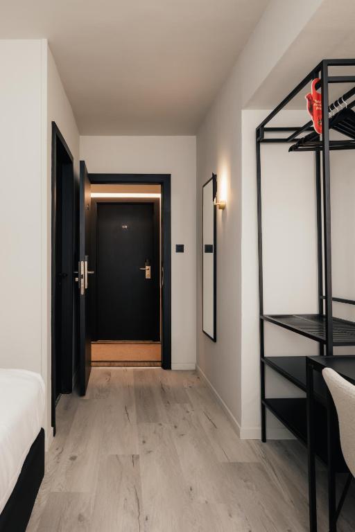 Postel nebo postele na pokoji v ubytování Hotel Au lit des ours