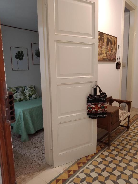 Posteľ alebo postele v izbe v ubytovaní Rosadamare appartamento