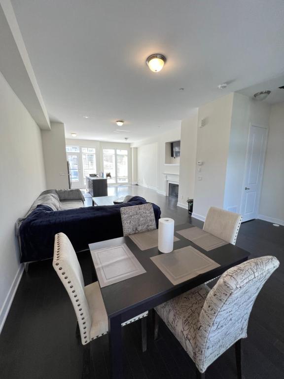 Cheerful 4-Bedroom Townhouse with a Suburban Feel! - Housity