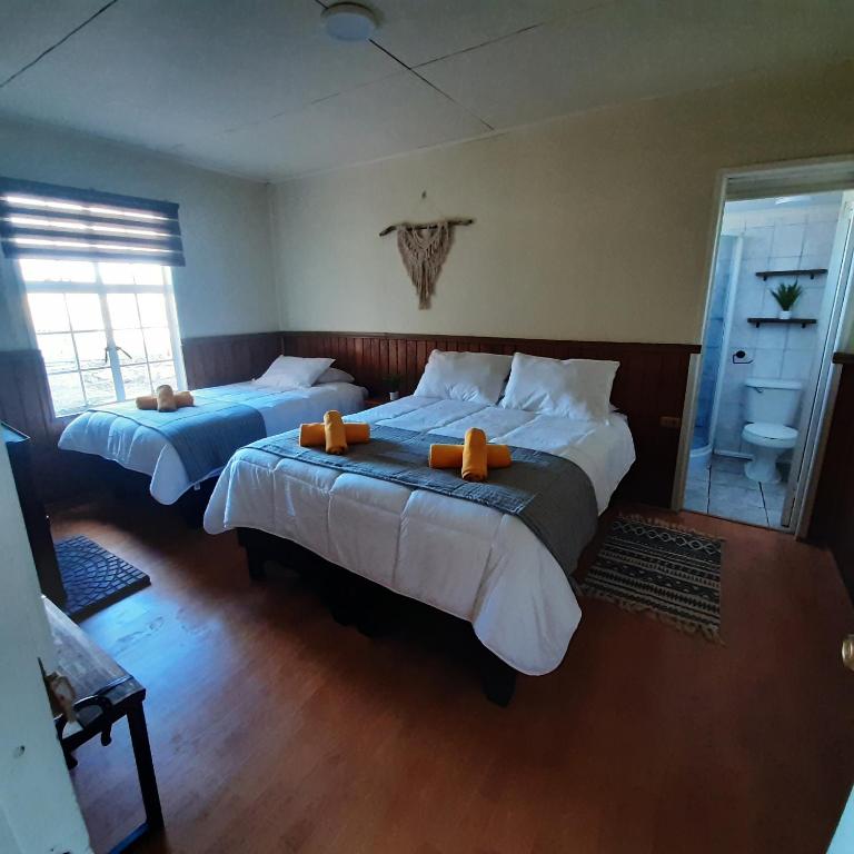 Voodi või voodid majutusasutuse Riverline lodge toas