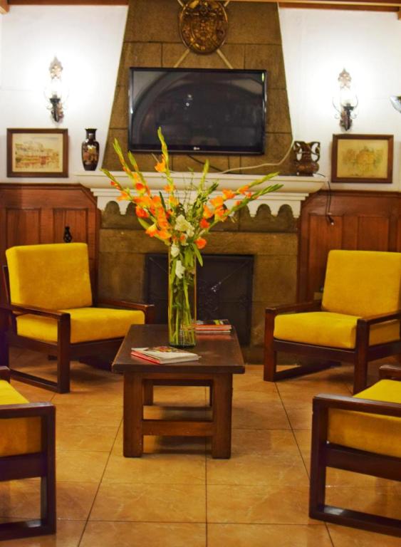 Posezení v ubytování Hotel Ambassador