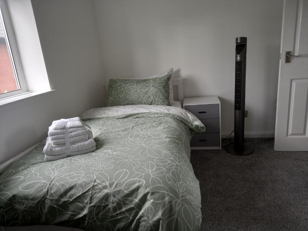 Postel nebo postele na pokoji v ubytování Cosy Home