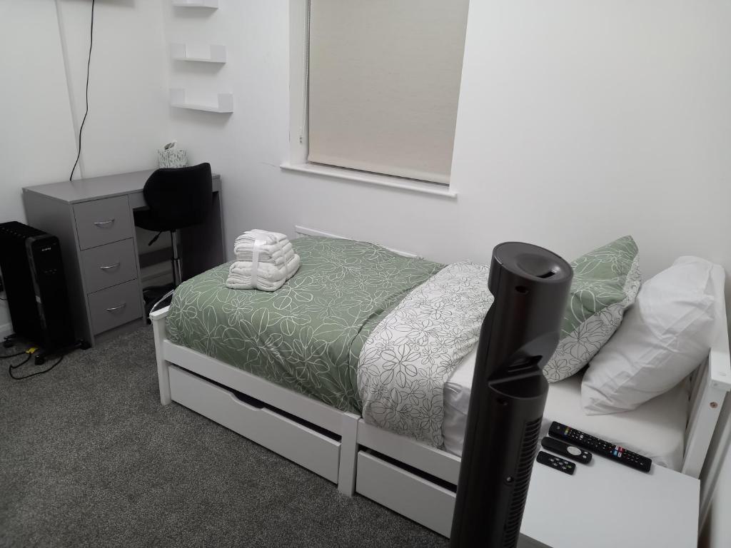 Postel nebo postele na pokoji v ubytování Cosy Home