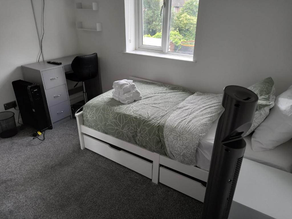Postel nebo postele na pokoji v ubytování Cosy Home
