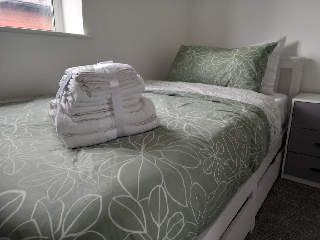 Postel nebo postele na pokoji v ubytování Cosy Home