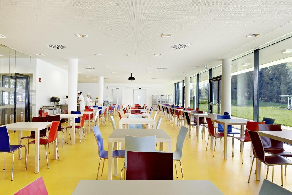 Reštaurácia alebo iné gastronomické zariadenie v ubytovaní Alm 34 mit 24 Stunden Self Check in