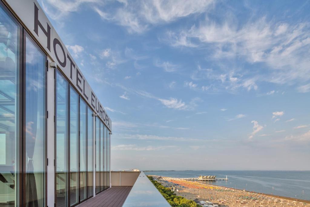 a building with a view of the ocean at Hotel Europa in Lignano Sabbiadoro