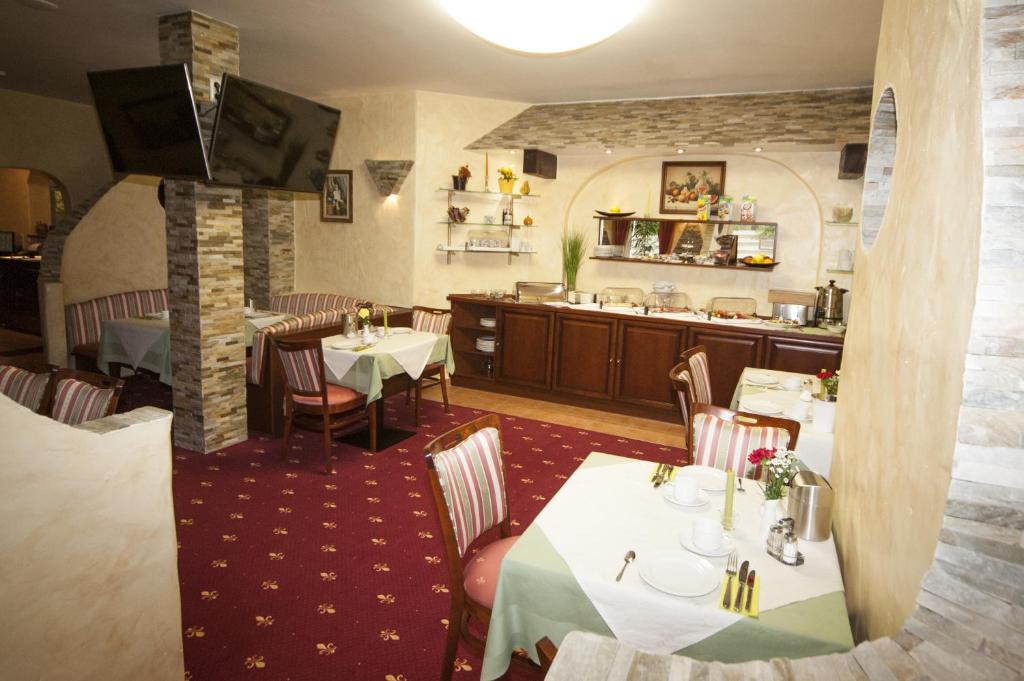 Lounge nebo bar v ubytování Hotel Medaillon